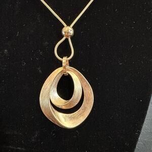 Gold Waterdrop Brushed Pendant on a Gold Rope Chain
